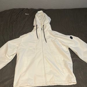 Selling Michael Kors wind breaker size larger the color white